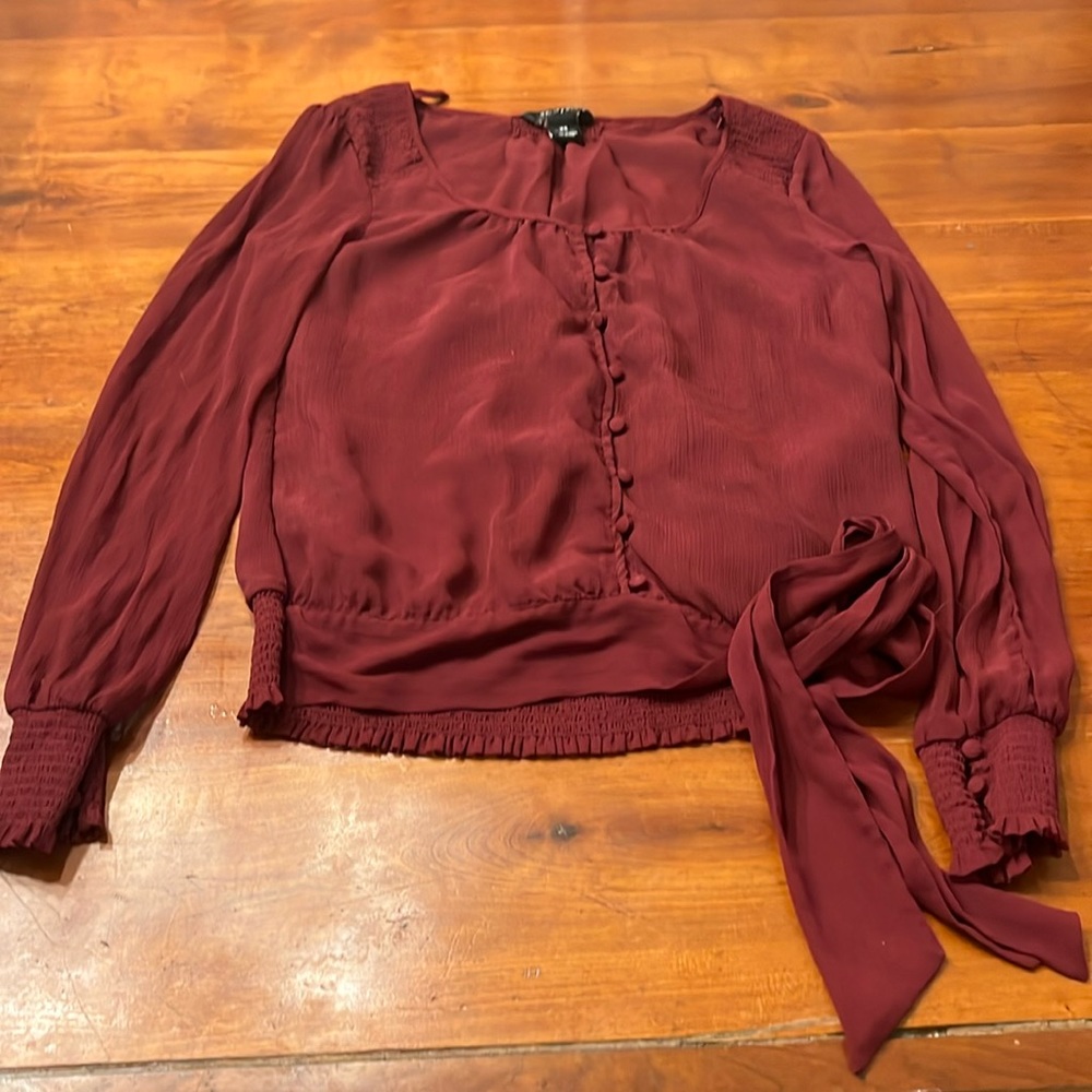 White House Black Market wine colored blouse